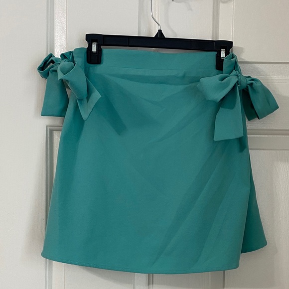 GB real flat front elastic waist aqua/teal skirt with side tie bow details - Picture 1 of 5